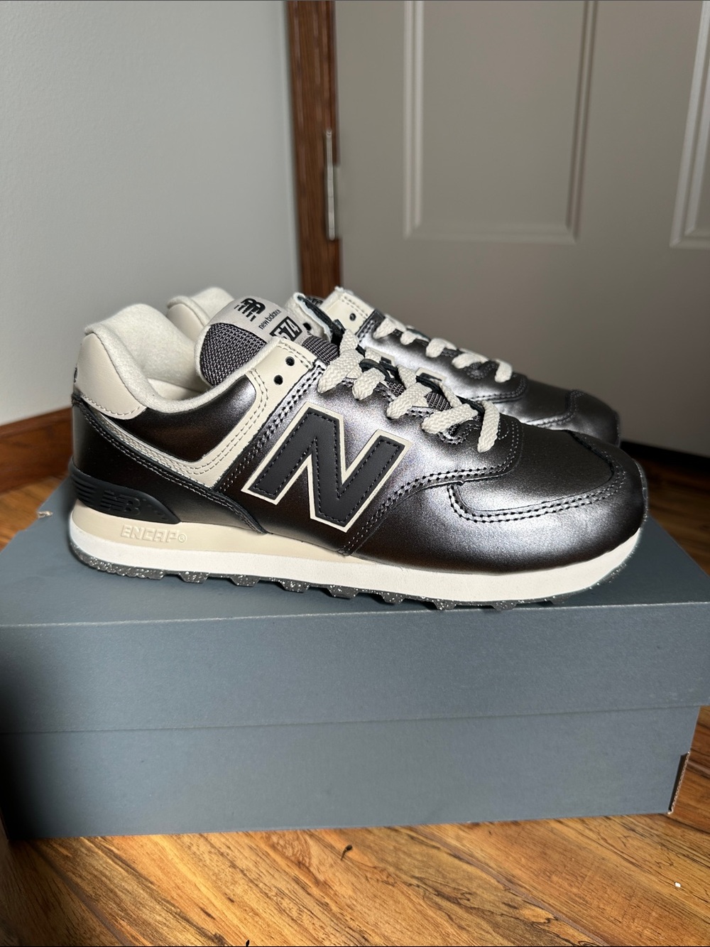 New Balance Women’s 574 Metallic Bronze and Black Sneaker size 9